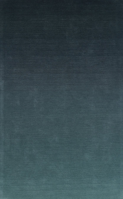 Ombre blue gradient fabric with brushed texture, from dark navy top to teal bottom; decorative textile.