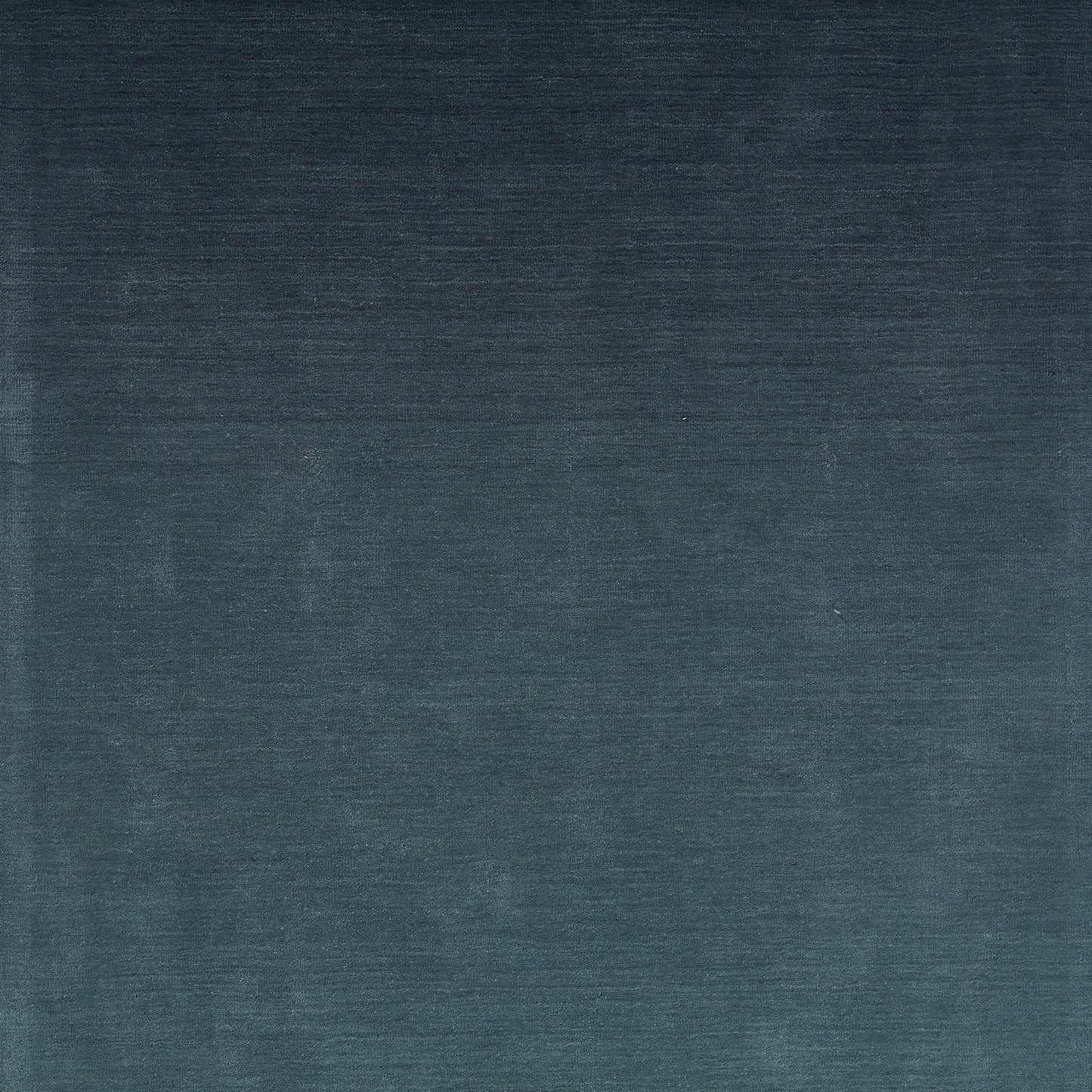 Blue ombre velvet fabric swatch with a dark navy to slate gradient and soft brushed texture.