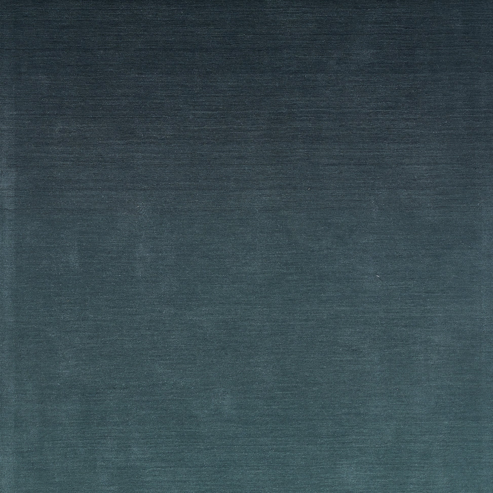 Blue ombre velvet fabric swatch with a dark navy to slate gradient and soft brushed texture.