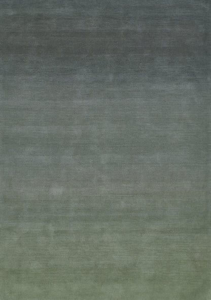Ombre gradient fabric texture, dark gray-blue at top fading to muted olive green at bottom.