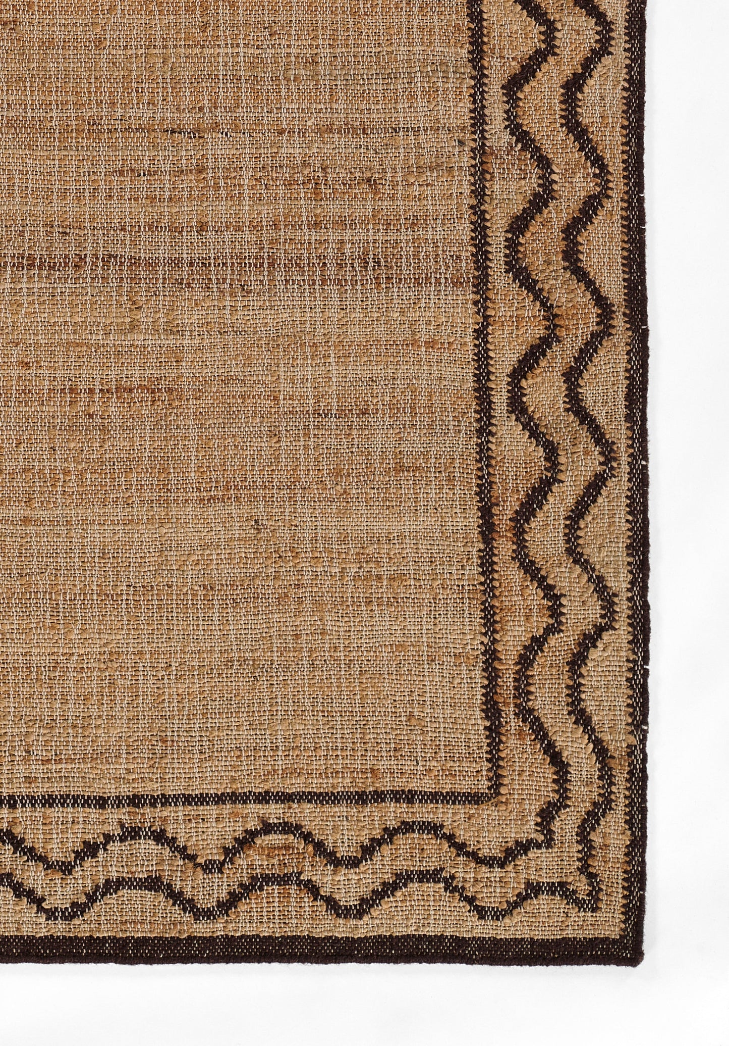 Beige jute rug with dark brown border and wavy zigzag edge trim, rustic natural style.