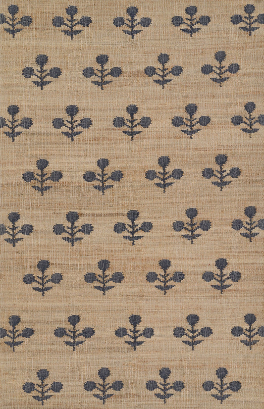 Beige woven fabric with navy blue floral motifs in a repeating pattern, rustic linen-style textile for upholstery or drapery.
