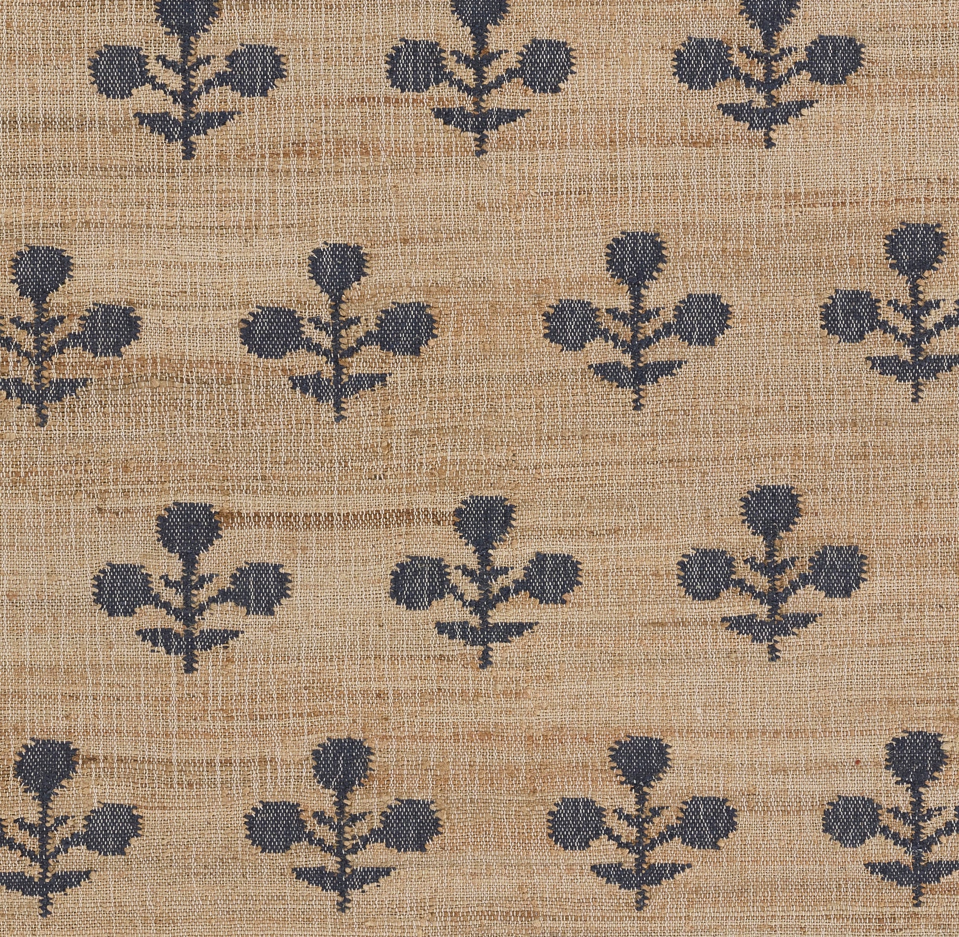 Beige woven rug with navy blue stylized floral clusters in a repeating pattern; rustic linen look; 2'3" x 8' runner