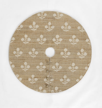 Natural tan burlap-style round rug with a white fleur-de-lis pattern.