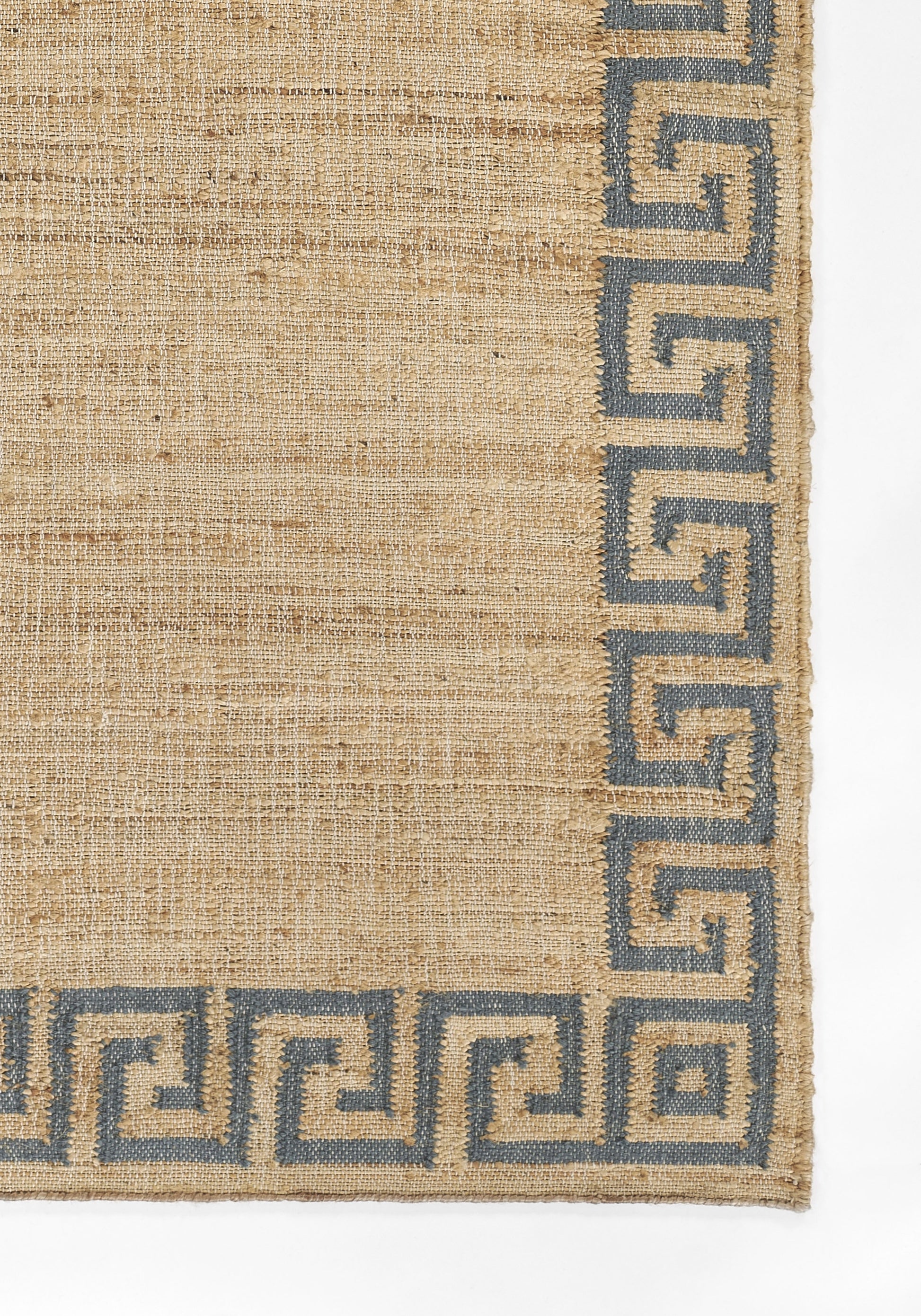Beige woven jute rug with blue Greek-key border along edges; rectangular, textured natural fiber.