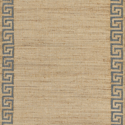 Natural beige jute rug with blue Greek key border along left and right edges.