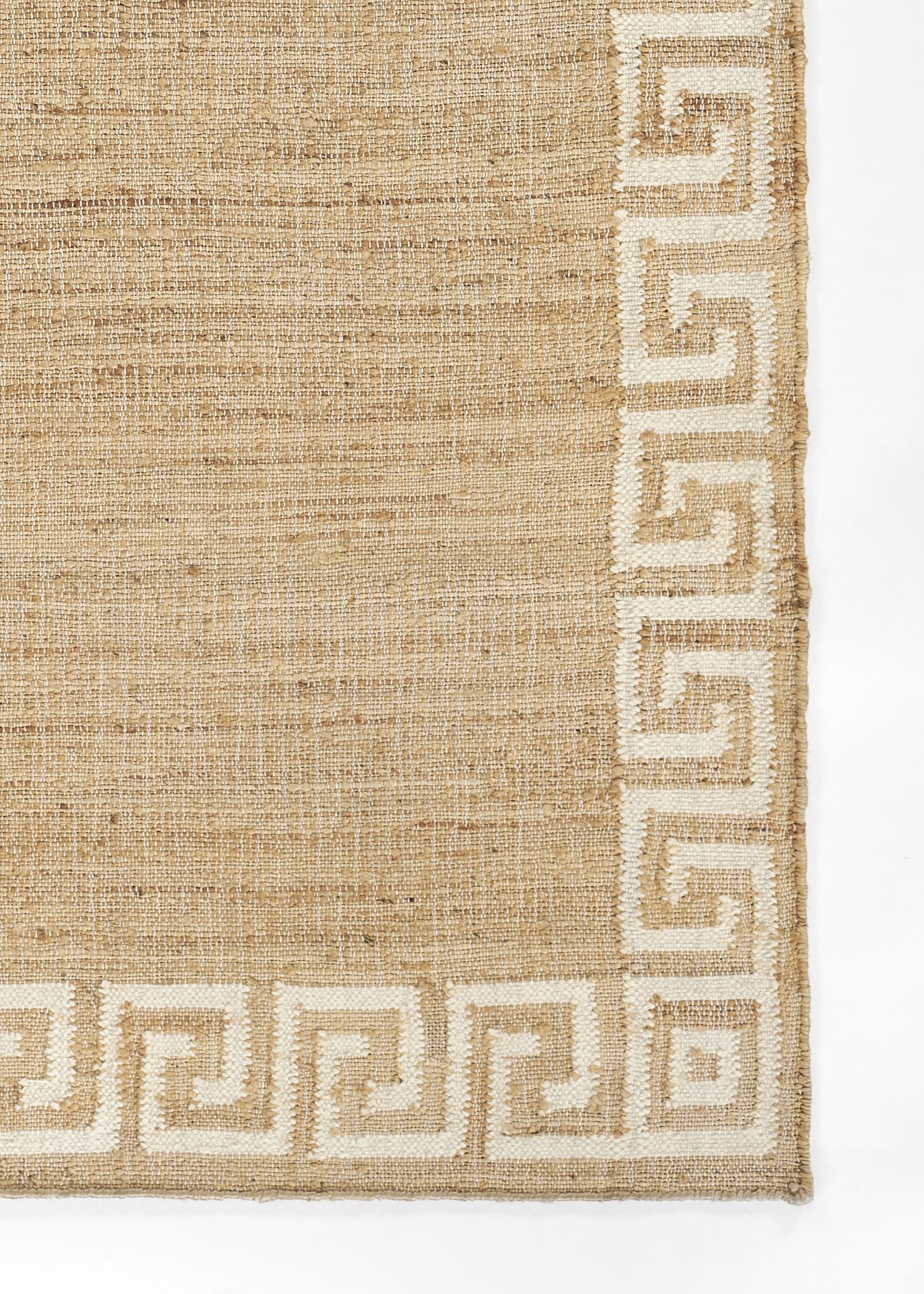 Natural jute runner with cream Greek key border, rectangular flat-weave in earthy beige tones.