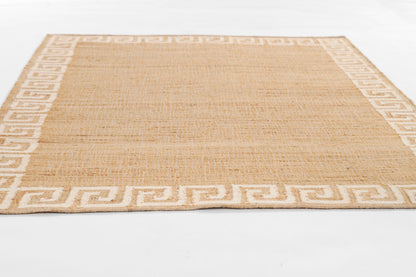 Rectangular natural jute rug with white Greek key border; flat-weave in warm beige.
