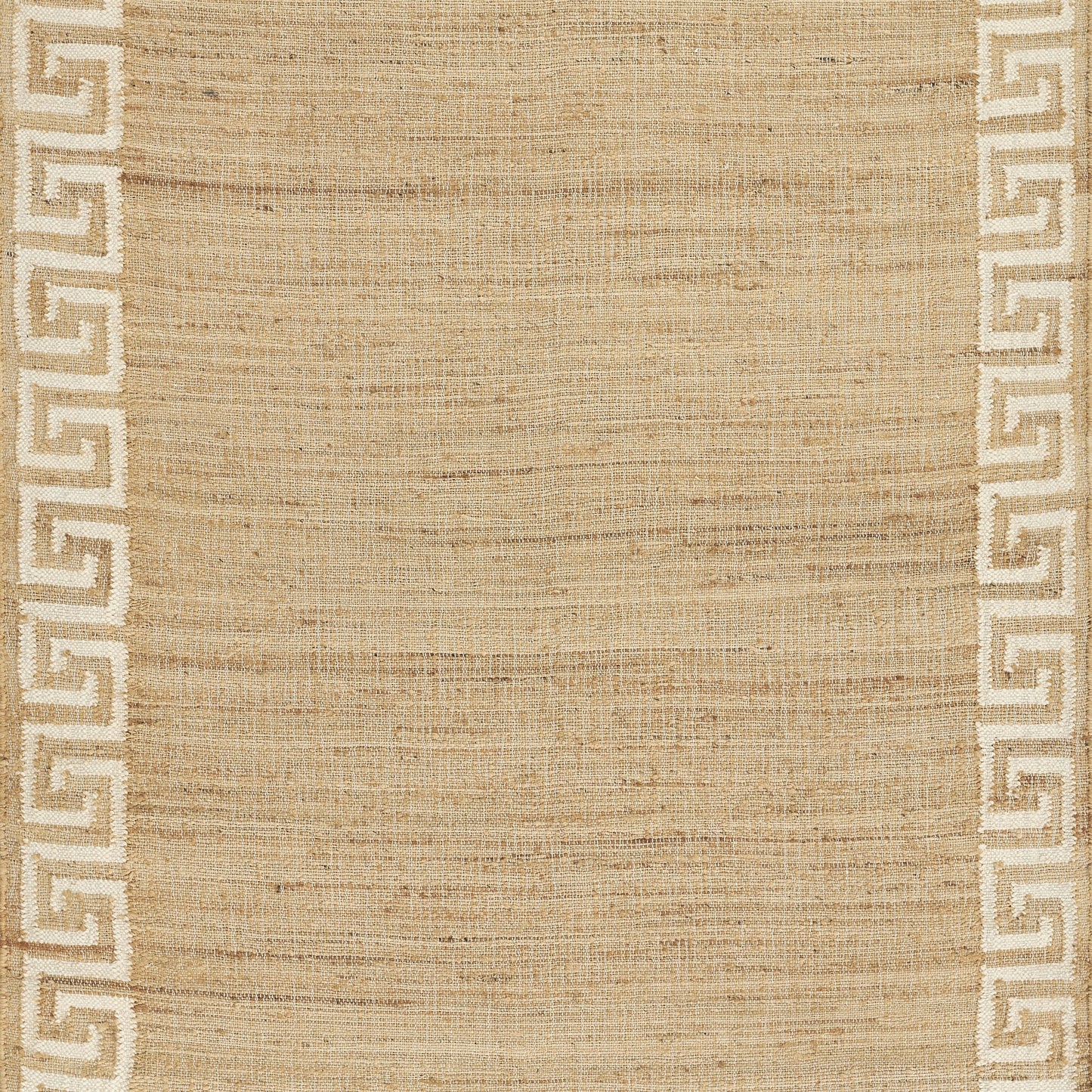Natural beige woven rug with cream Greek-key border on the sides.