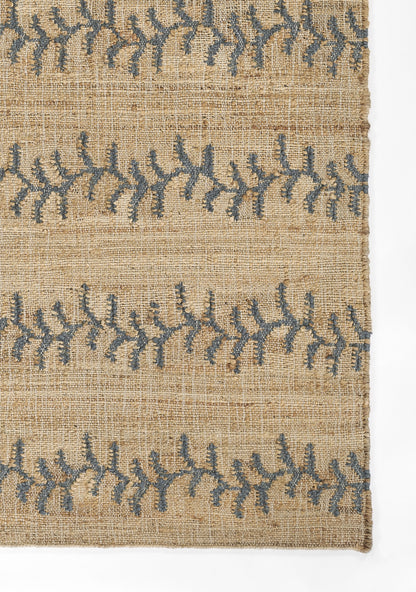 Beige jute rug with blue vine stripe pattern, flat-weave, rectangular; rustic boho decor.
