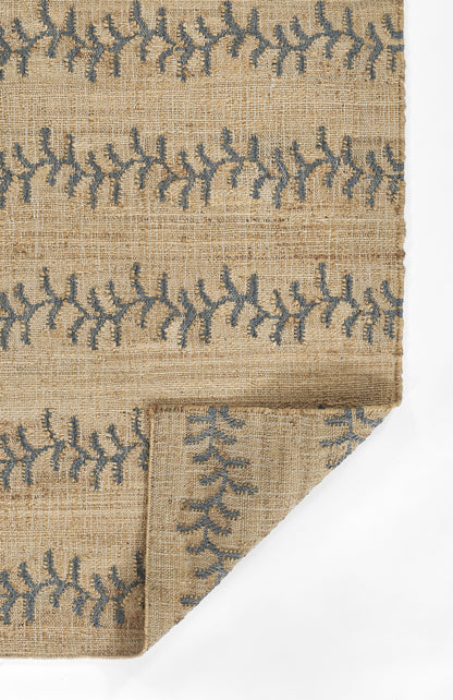 Beige jute runner rug with blue vine stripe pattern, woven texture; folded corner, rustic boho decor.