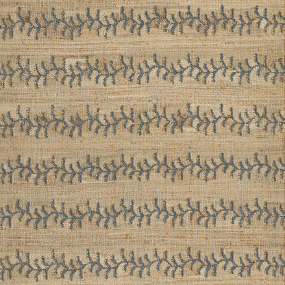 Beige woven jute rug with horizontal bands of blue vine-like motifs in repeating pattern.