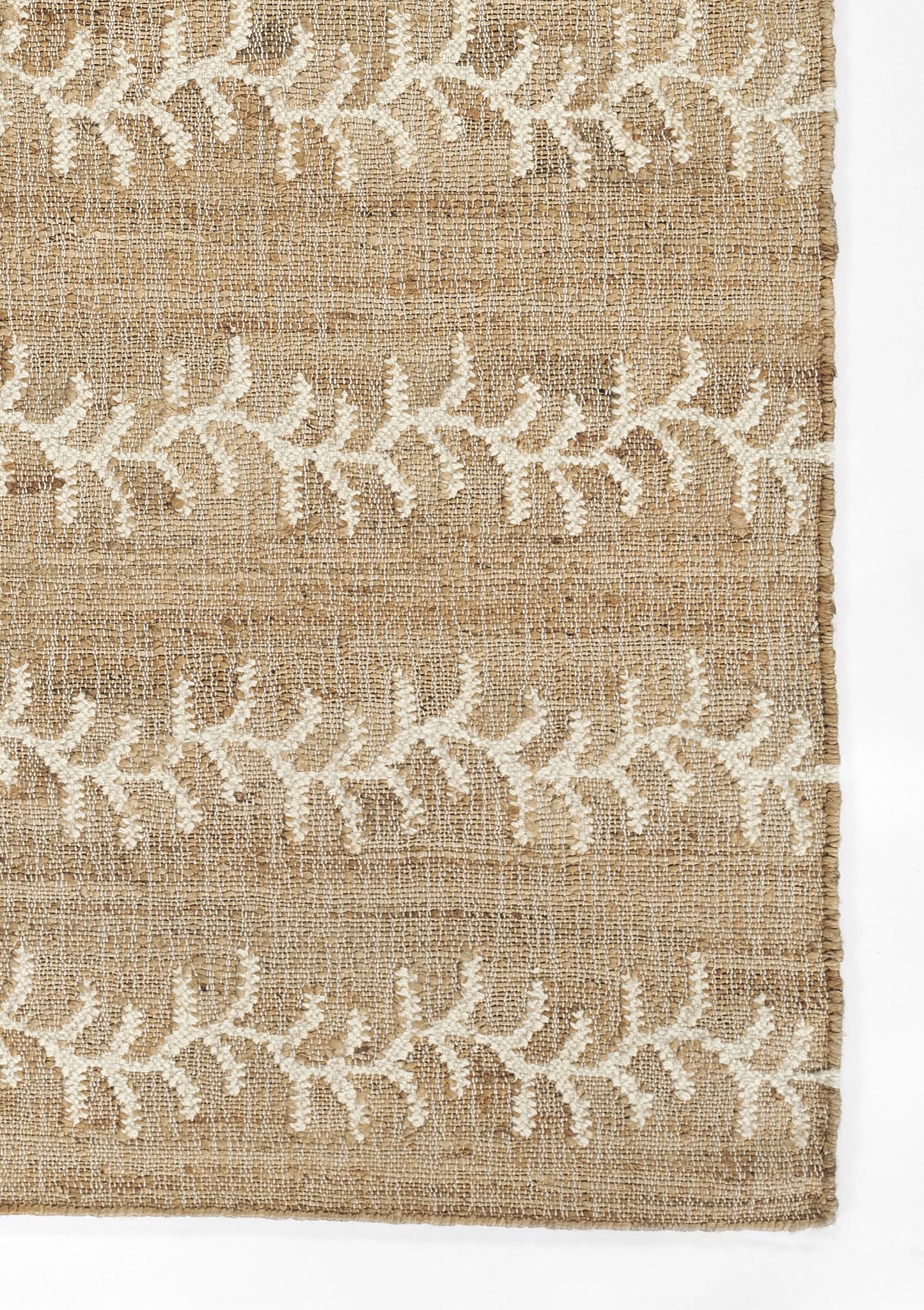 Beige burlap rug with white embroidered leafy vine pattern in horizontal bands, rustic natural texture.
