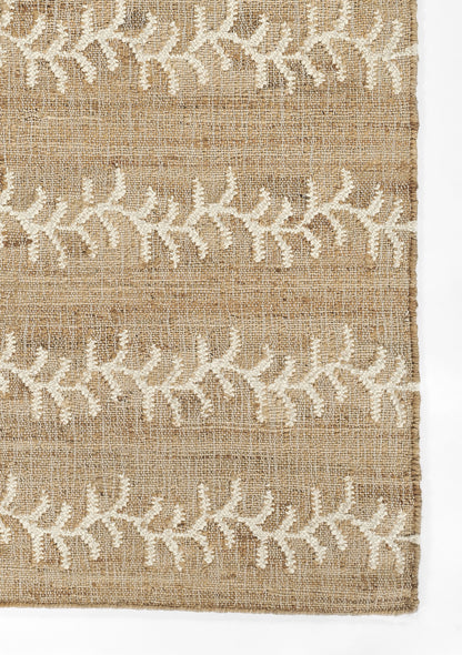 Beige burlap rug with white embroidered leafy vine pattern in horizontal bands, rustic natural texture.
