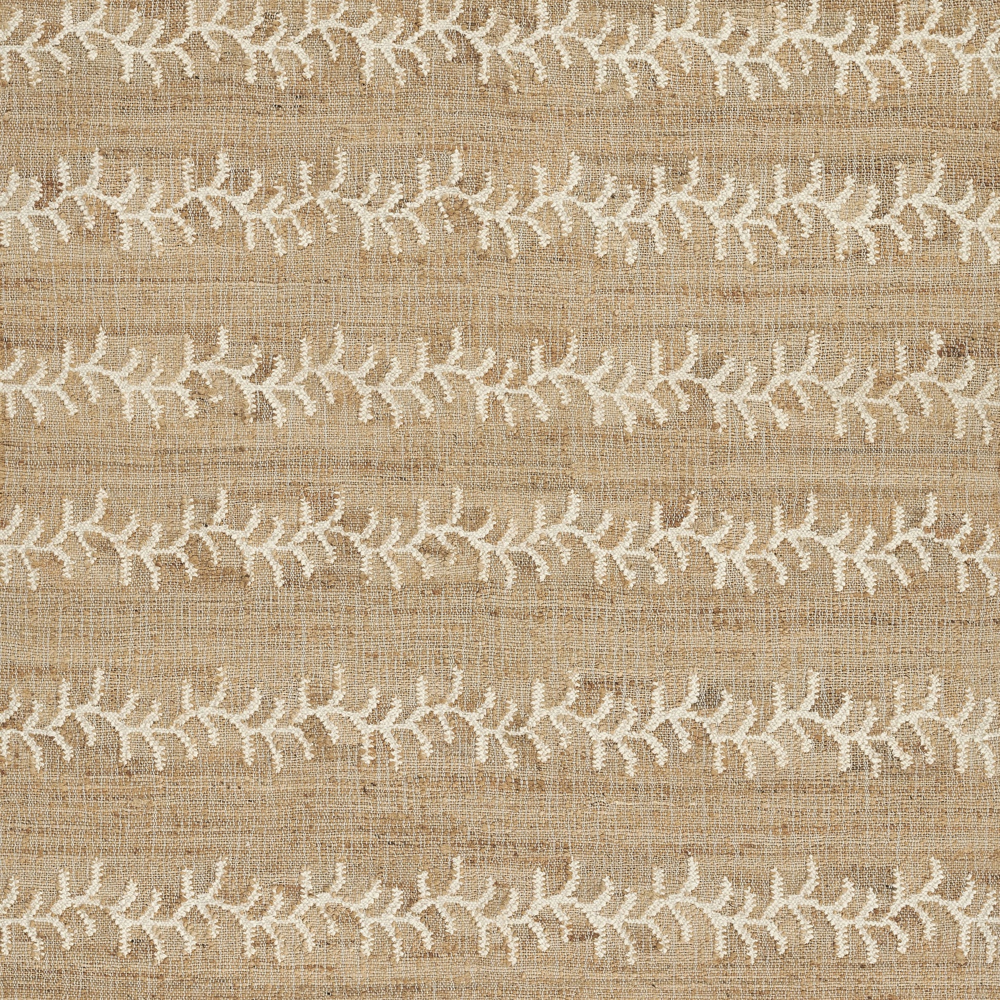 Beige rug with white embroidered leafy vine pattern in horizontal stripes; rustic boho rug.