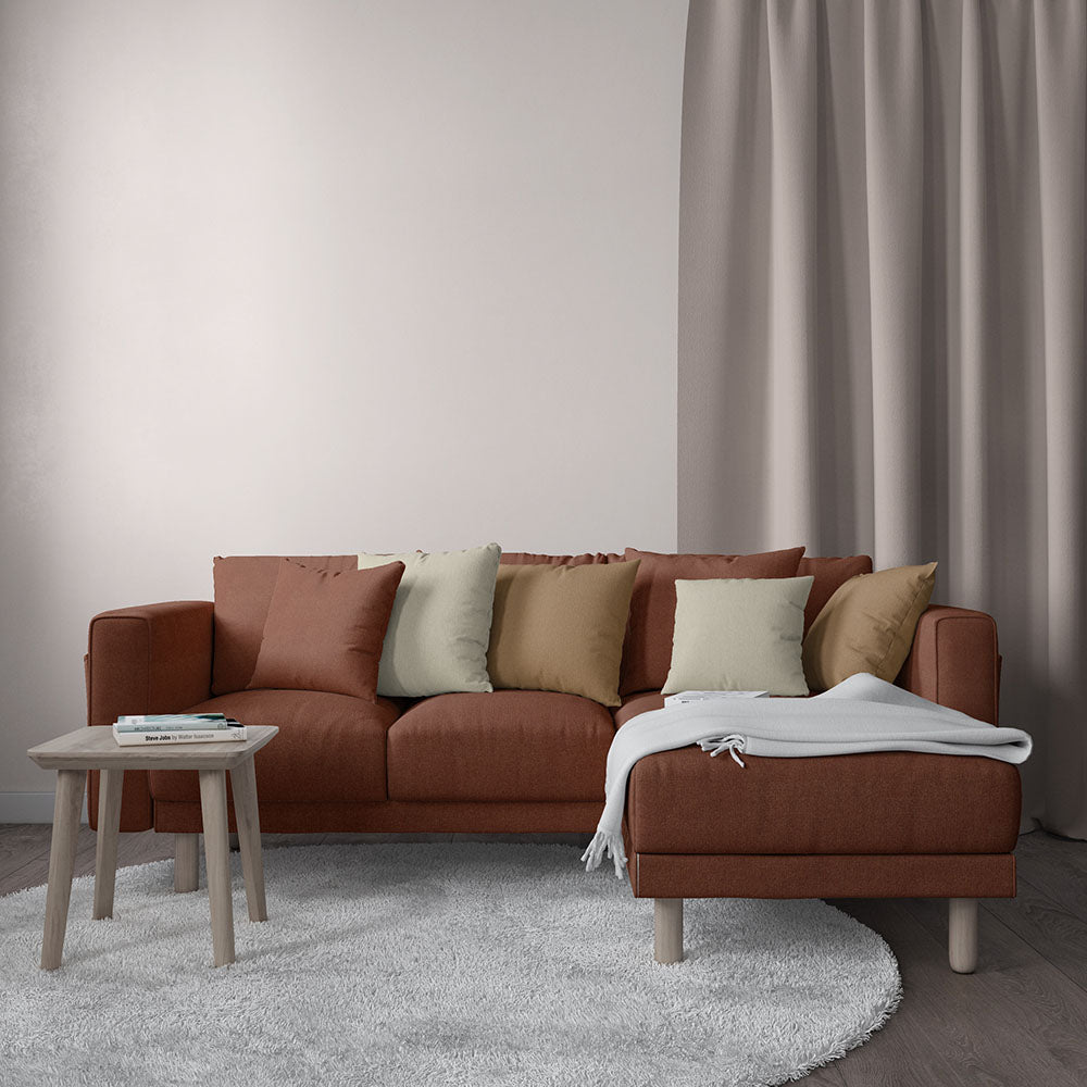 Rust-orange solid fabric swatch with woven texture