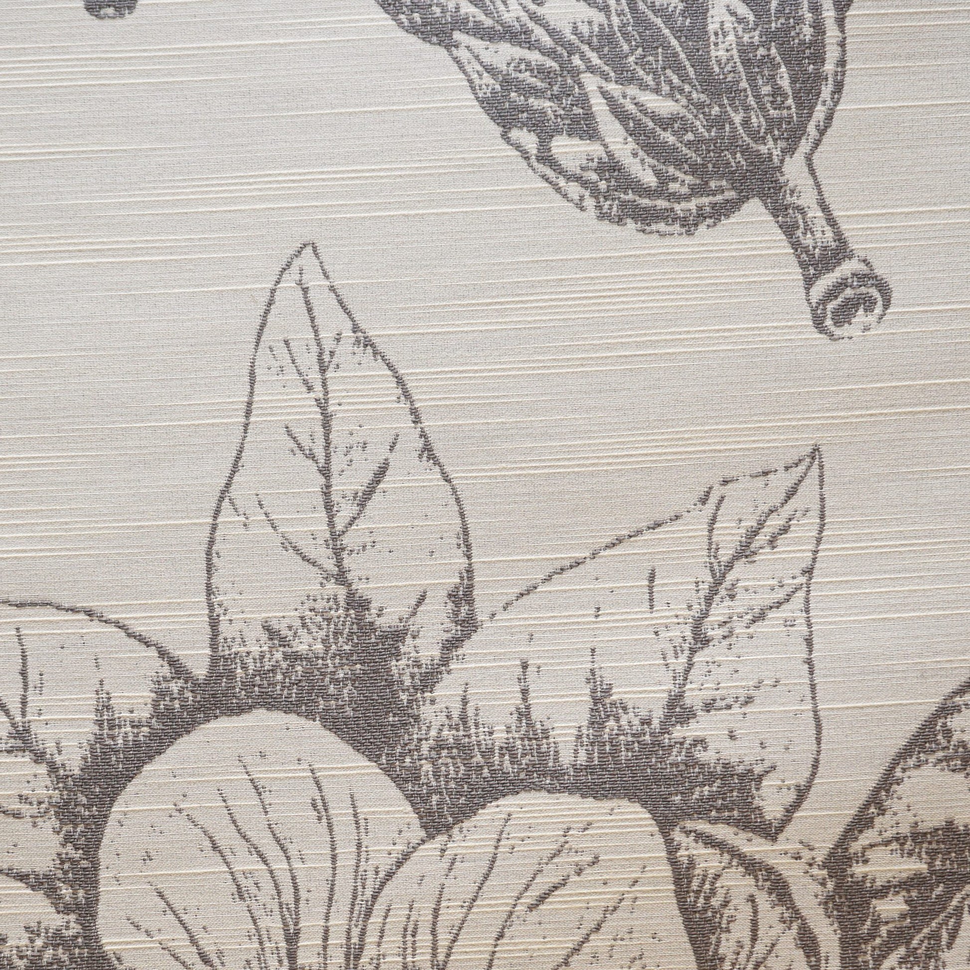 Beige fabric with a gray botanical print featuring large veined leaves and round fruit.