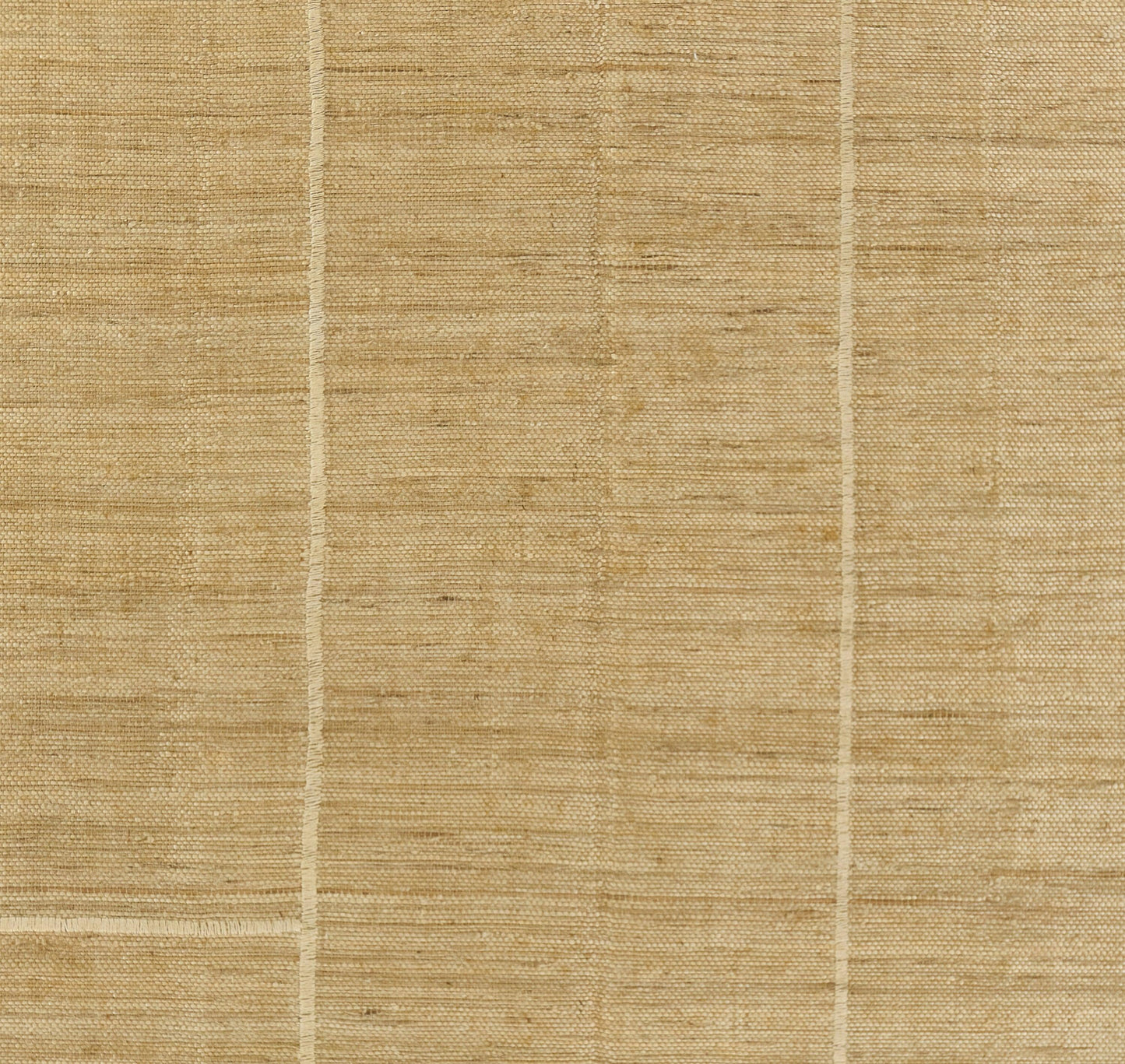 Rectangular natural palm fiber rug in light tan with pale grid lines; flat-woven, rustic decorative mat.