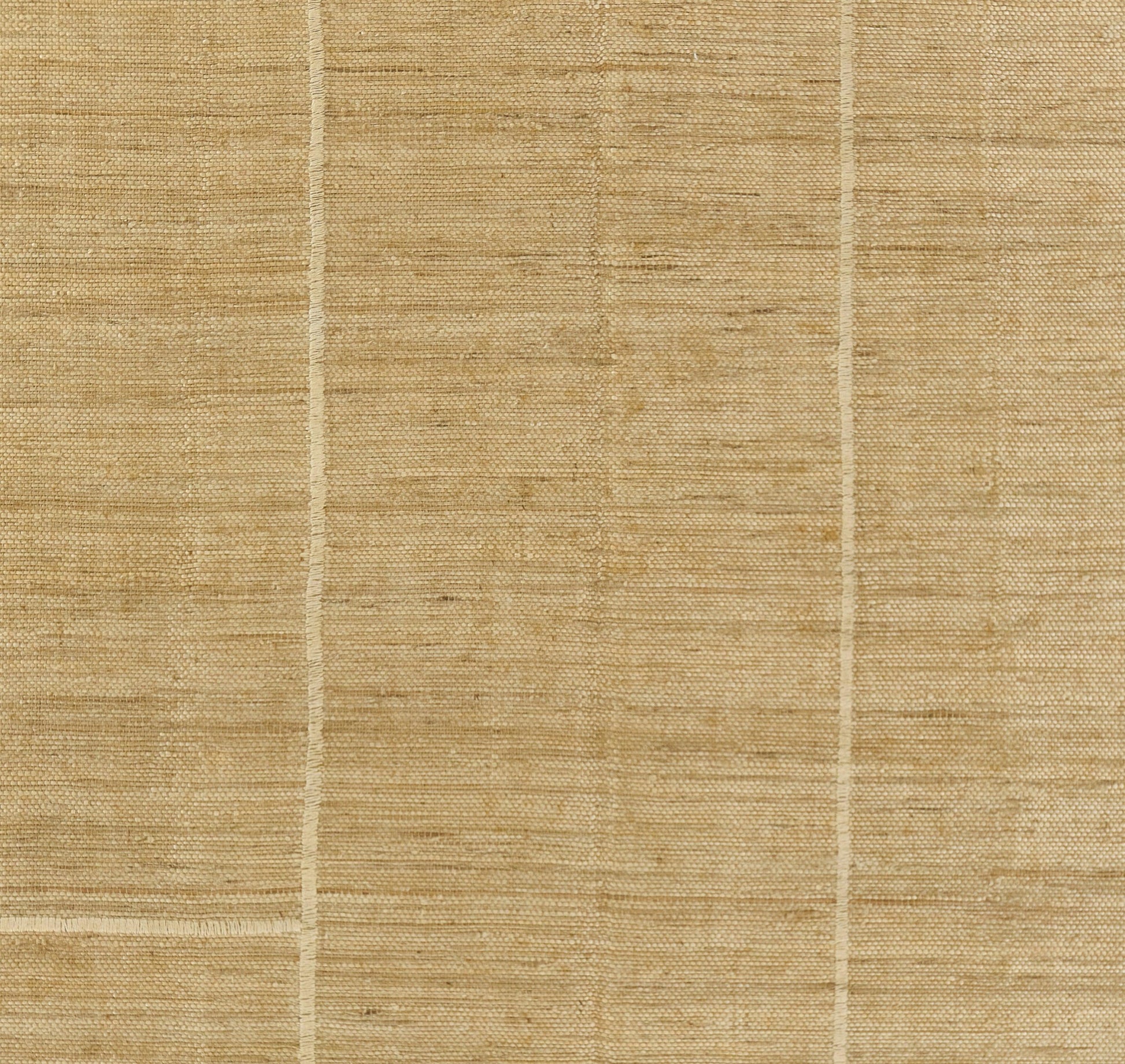 Rectangular natural palm fiber rug in light tan with pale grid lines; flat-woven, rustic decorative mat.