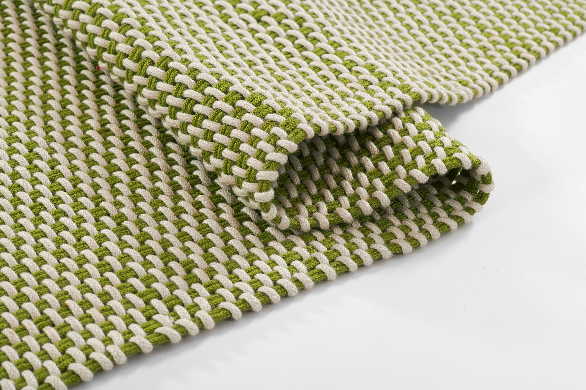 Olive green and ivory chunky woven runner rug with basket-weave texture, 3' x 8'.