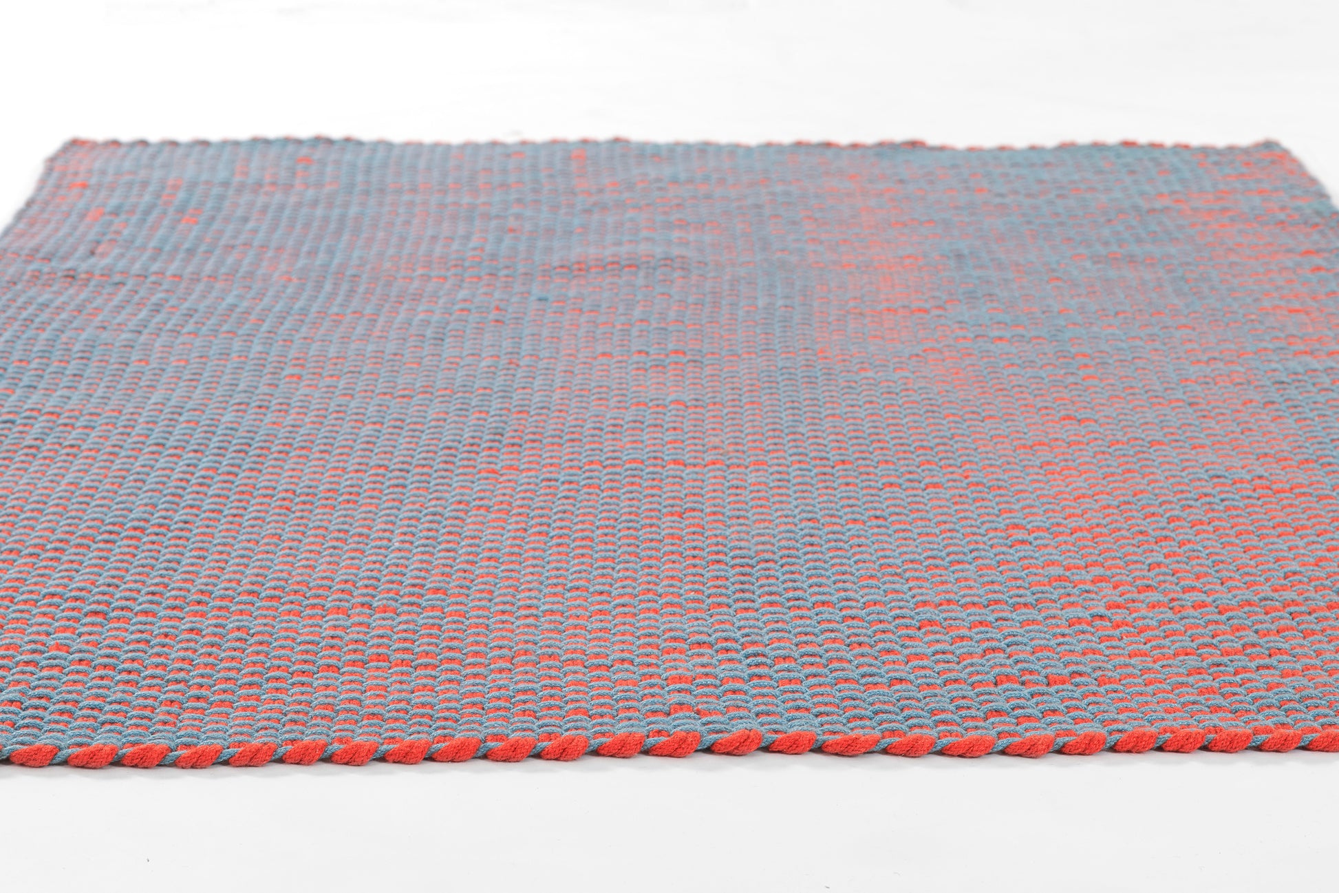 Blue-gray paracord woven runner rug with a red braided edge and rope-like textured weave, 3' x 8'.