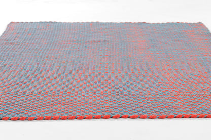 Blue-gray paracord woven runner rug with a red braided edge and rope-like textured weave, 3' x 8'.