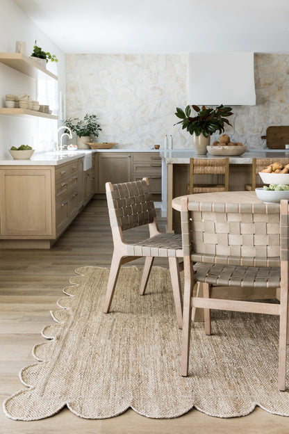 Beige natural jute rug with woven texture, 5' x 8'.