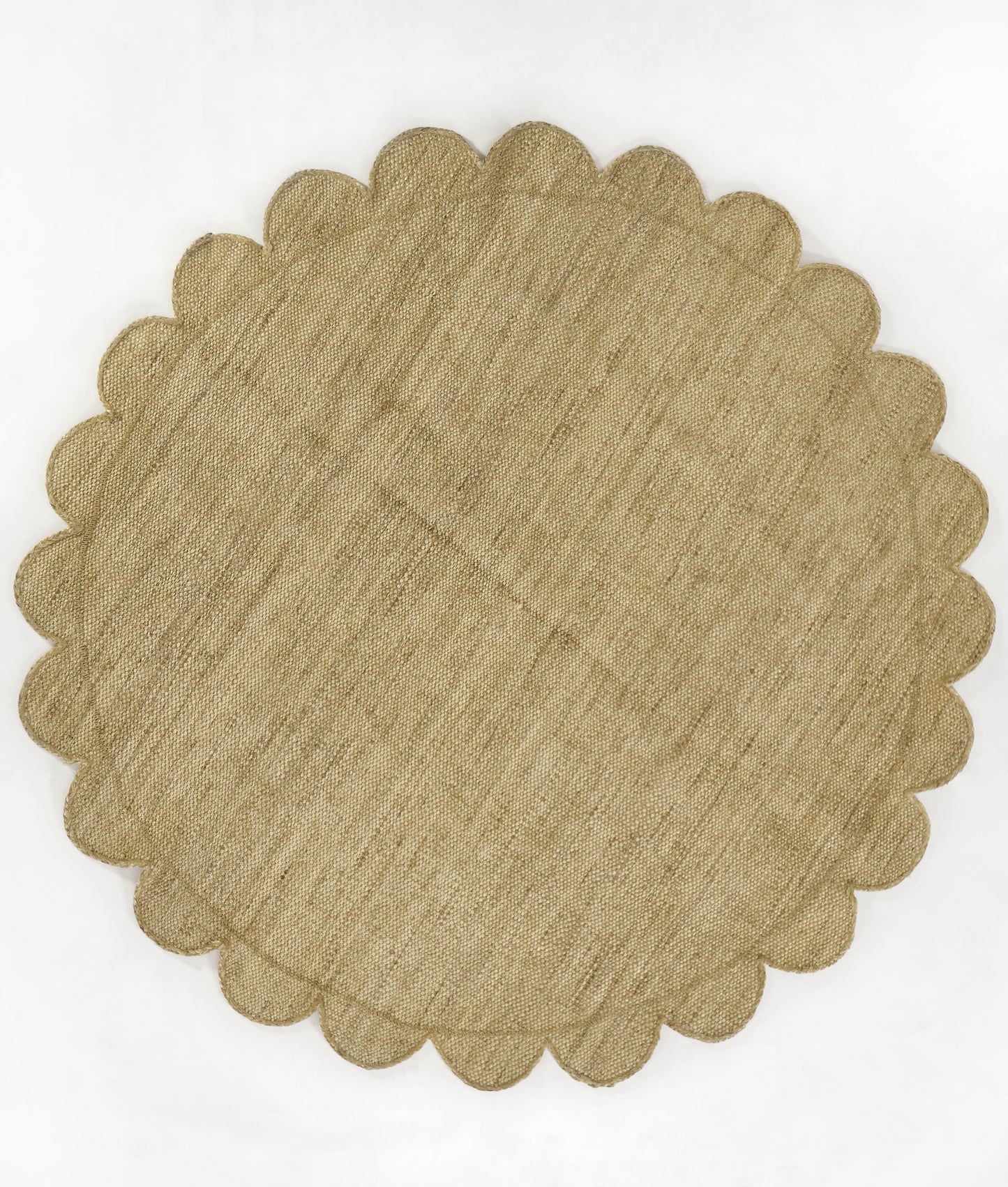 Round natural burlap placemat with scalloped edge; rustic beige texture for table settings.
