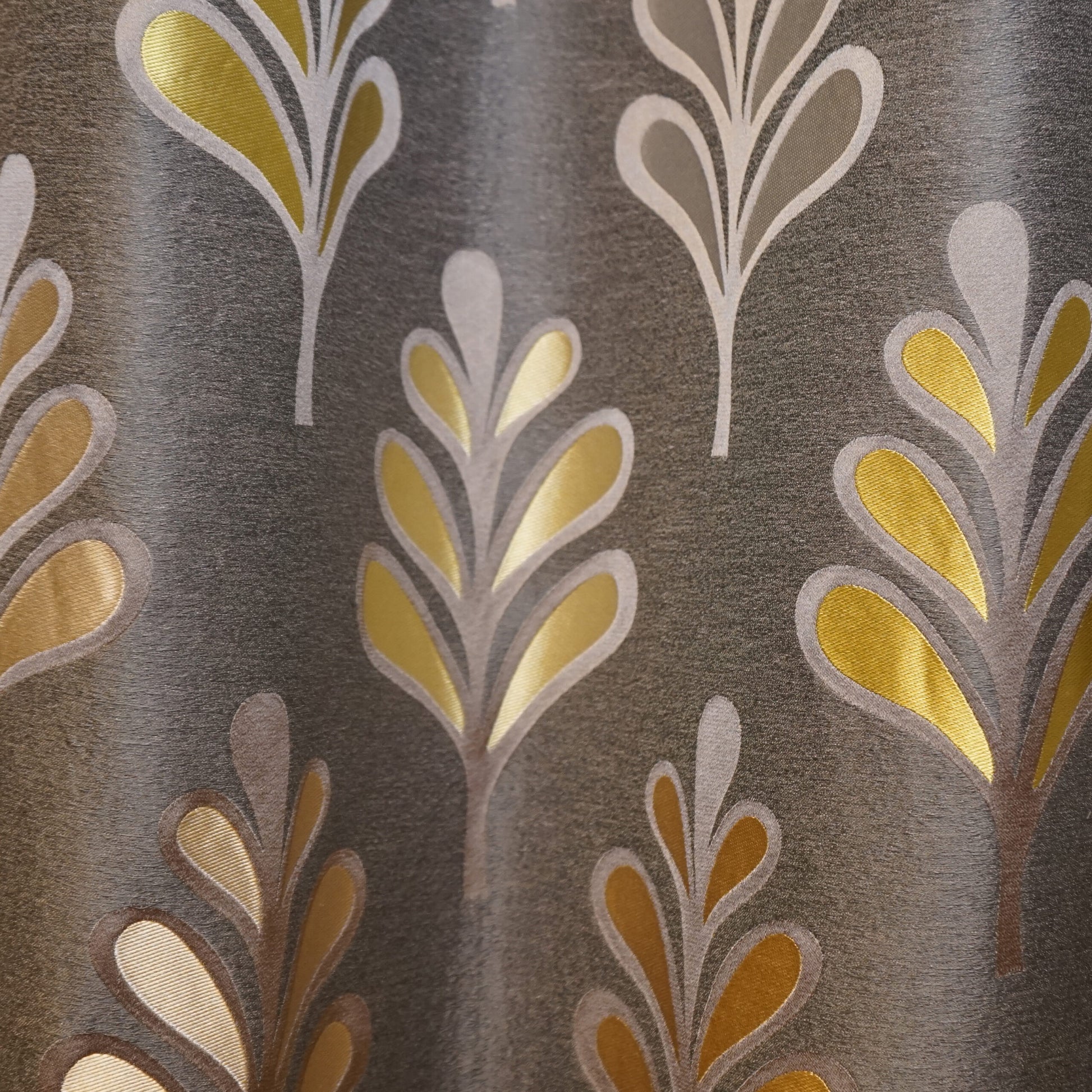 Gray fabric with metallic gold and silver leaf motifs in a partridge-inspired repeating pattern.