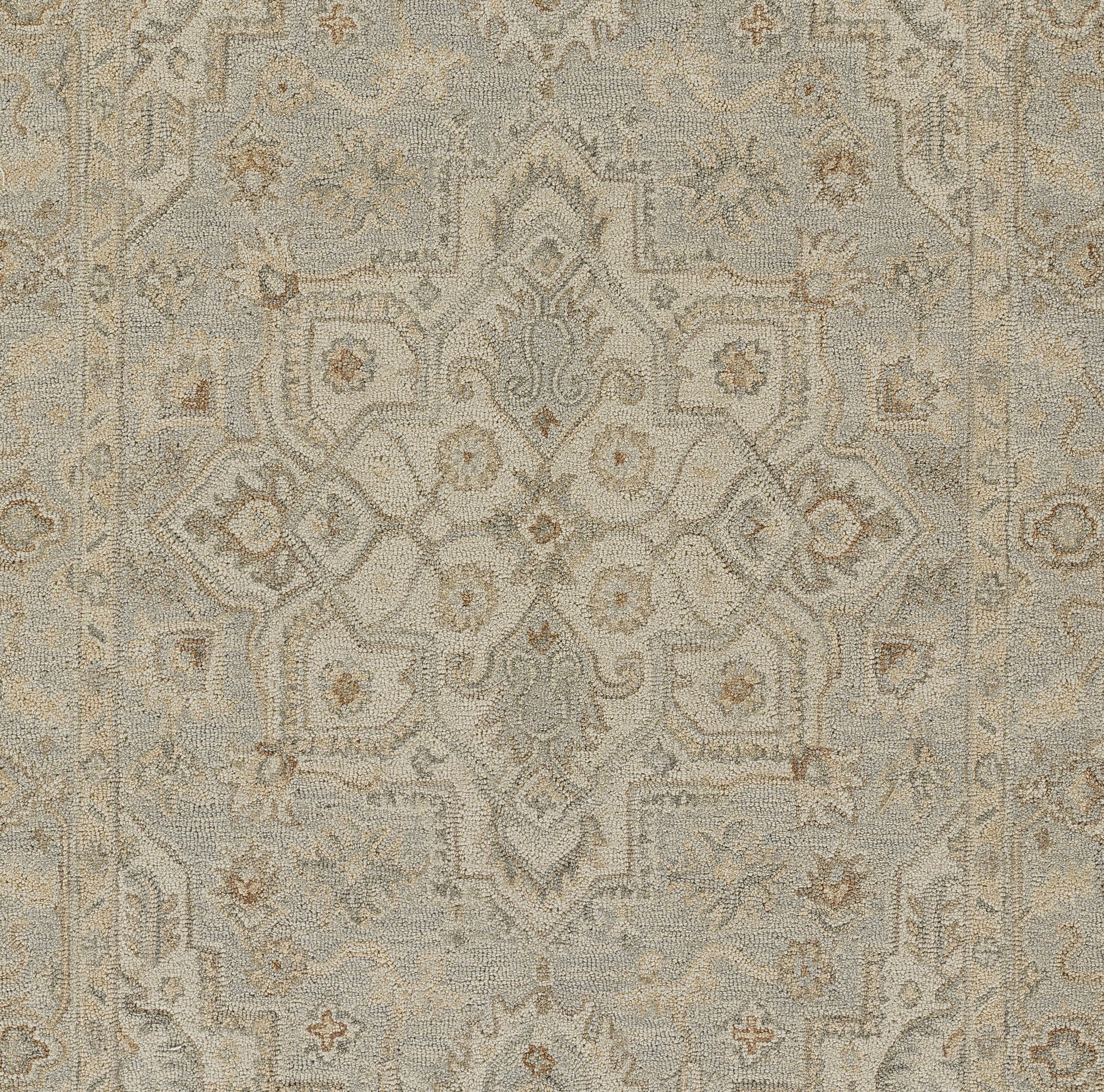 Neutral-toned Persian-style rug with an ornate central medallion and floral motifs in beige and ivory.
