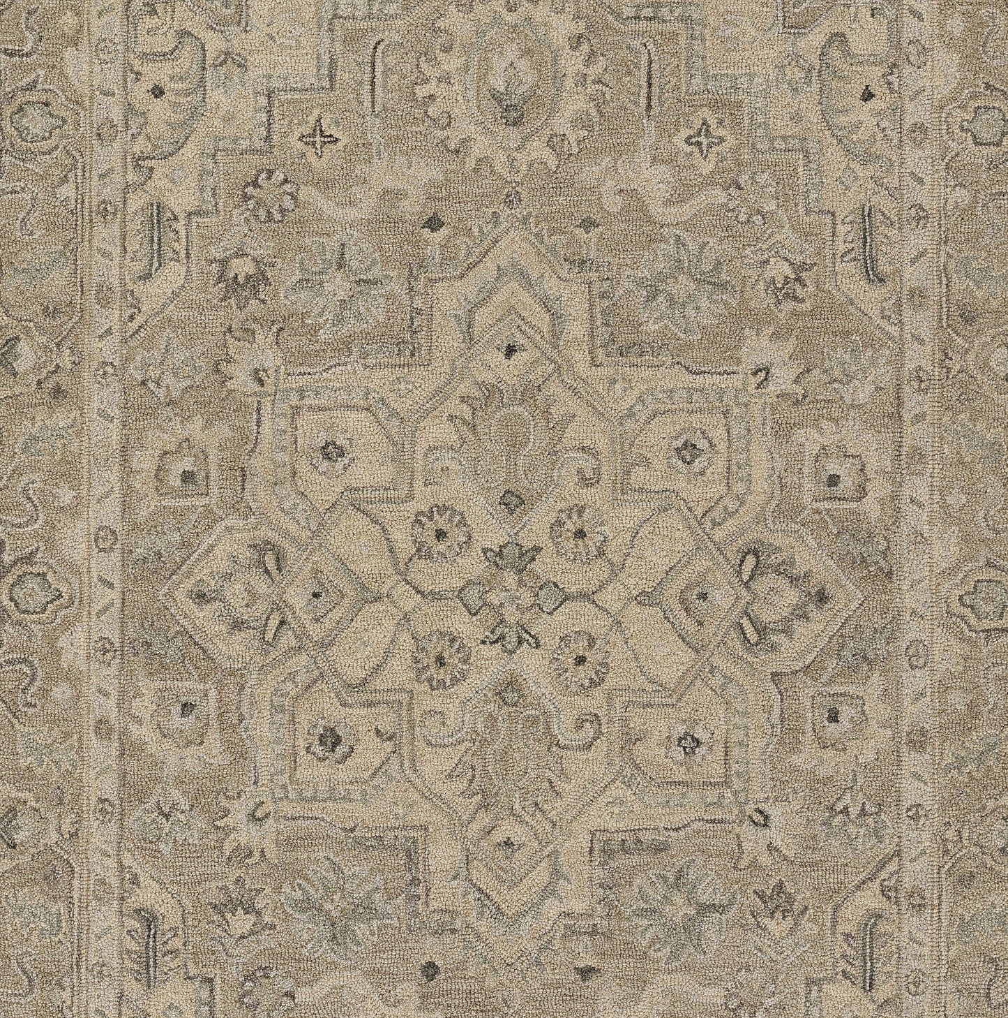 Taupe-toned Persian-style area rug with a central floral medallion and intricate borders in a muted beige-gray palette.