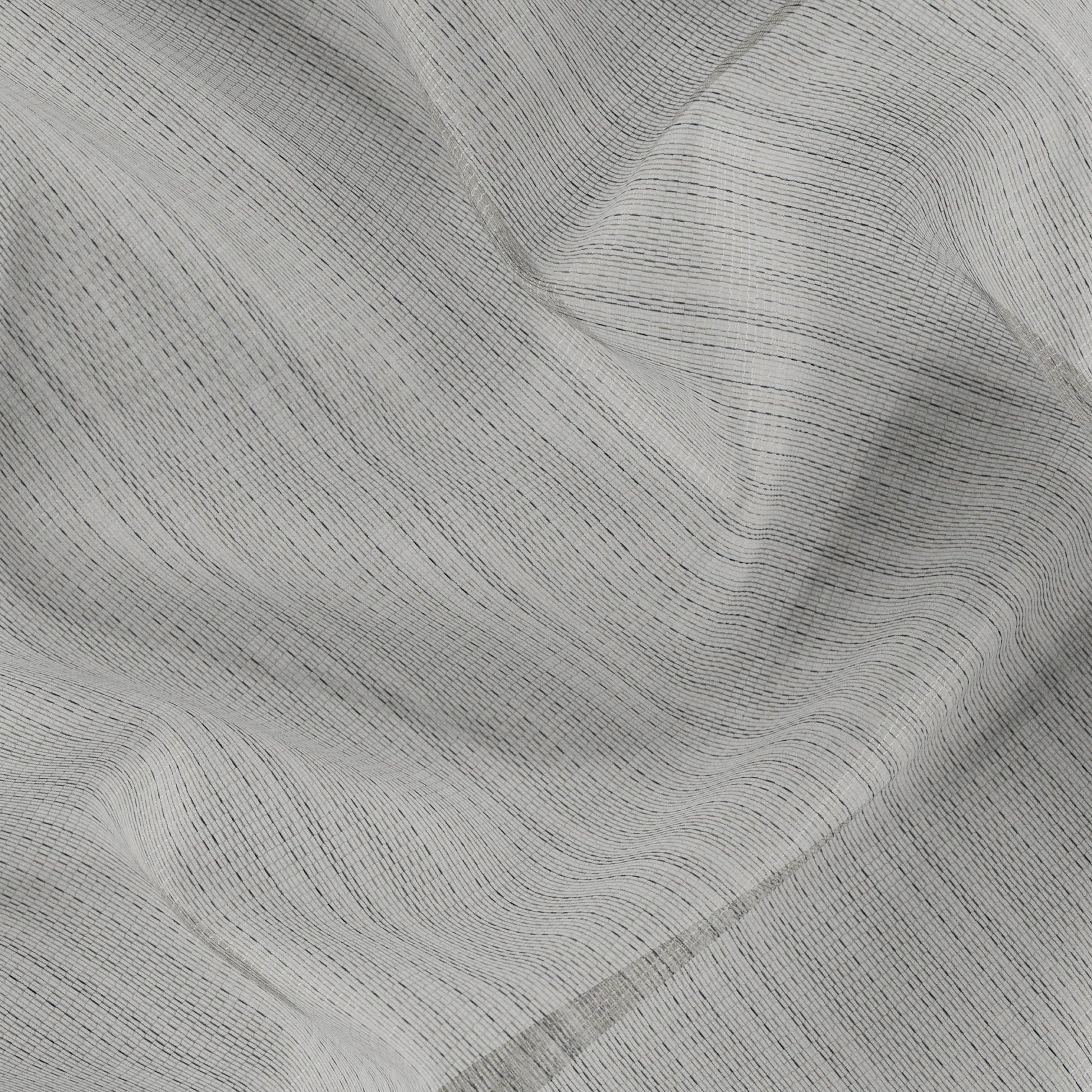 Geometric textured fabric in grey, black, green and cream; wide-width fabric.