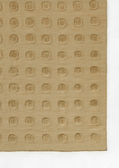 Taupe fabric swatch with a grid of embossed circular dots on a textured woven surface.