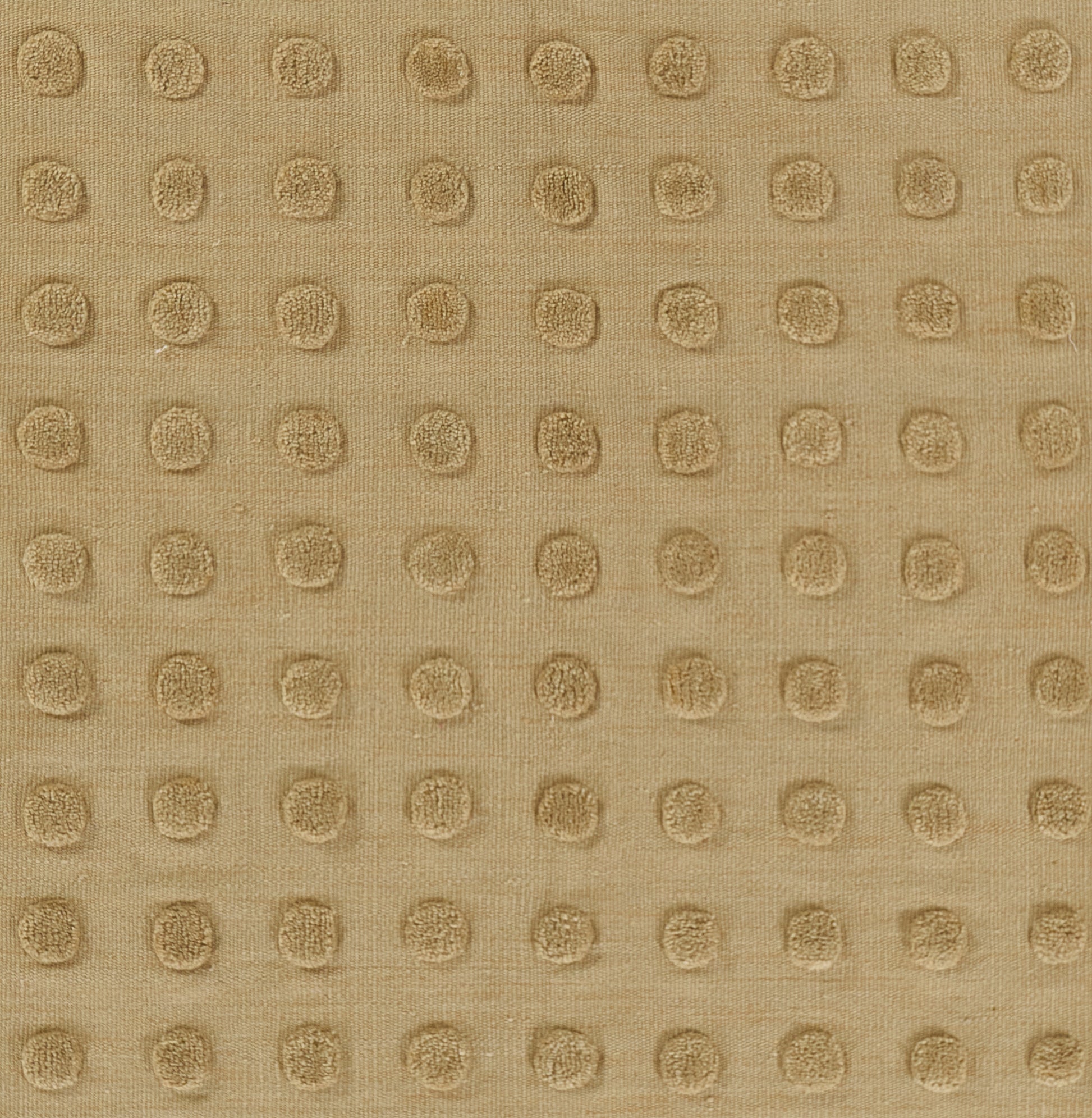 Taupe fabric with raised circular dots in a grid, creating a textured dotted pattern.