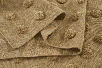 Taupe boucle knit scarf with raised bobble dots and soft woven texture.