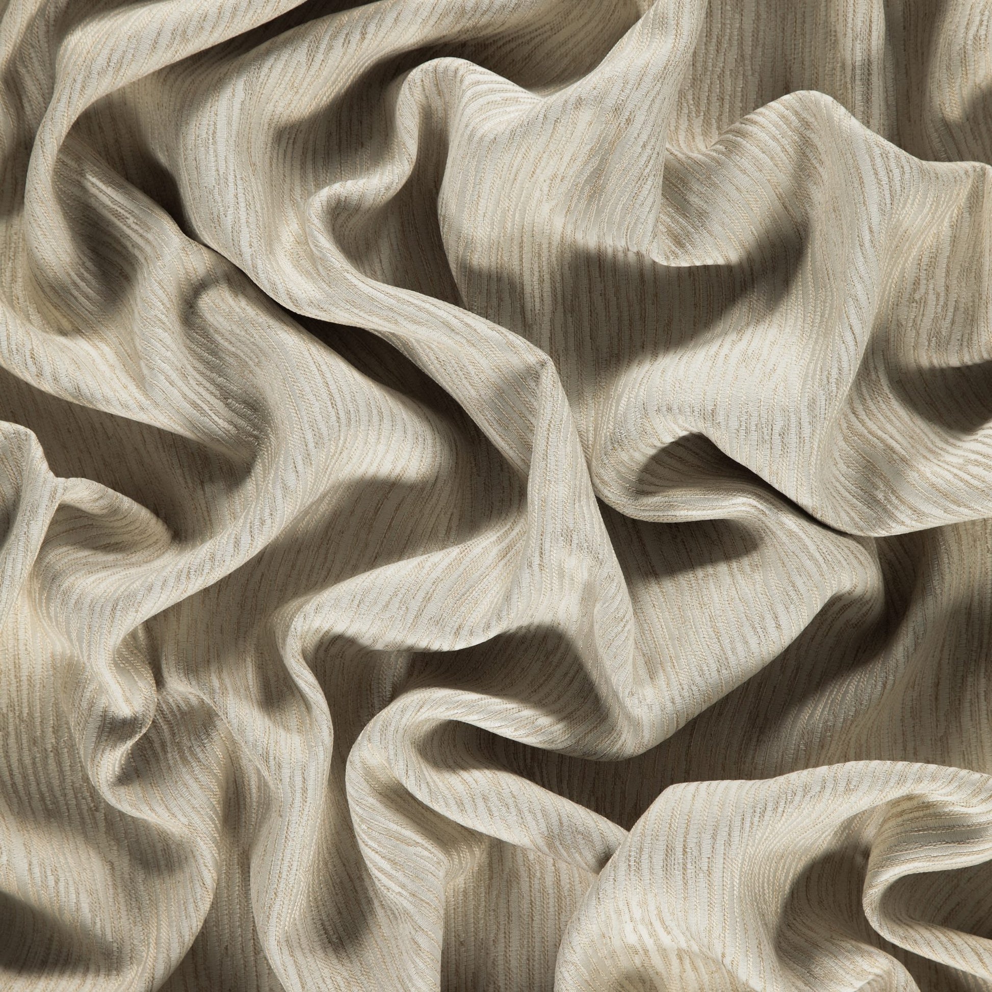 Cream-beige linen-like fabric with subtle vertical stripes, softly draped in flowing folds.