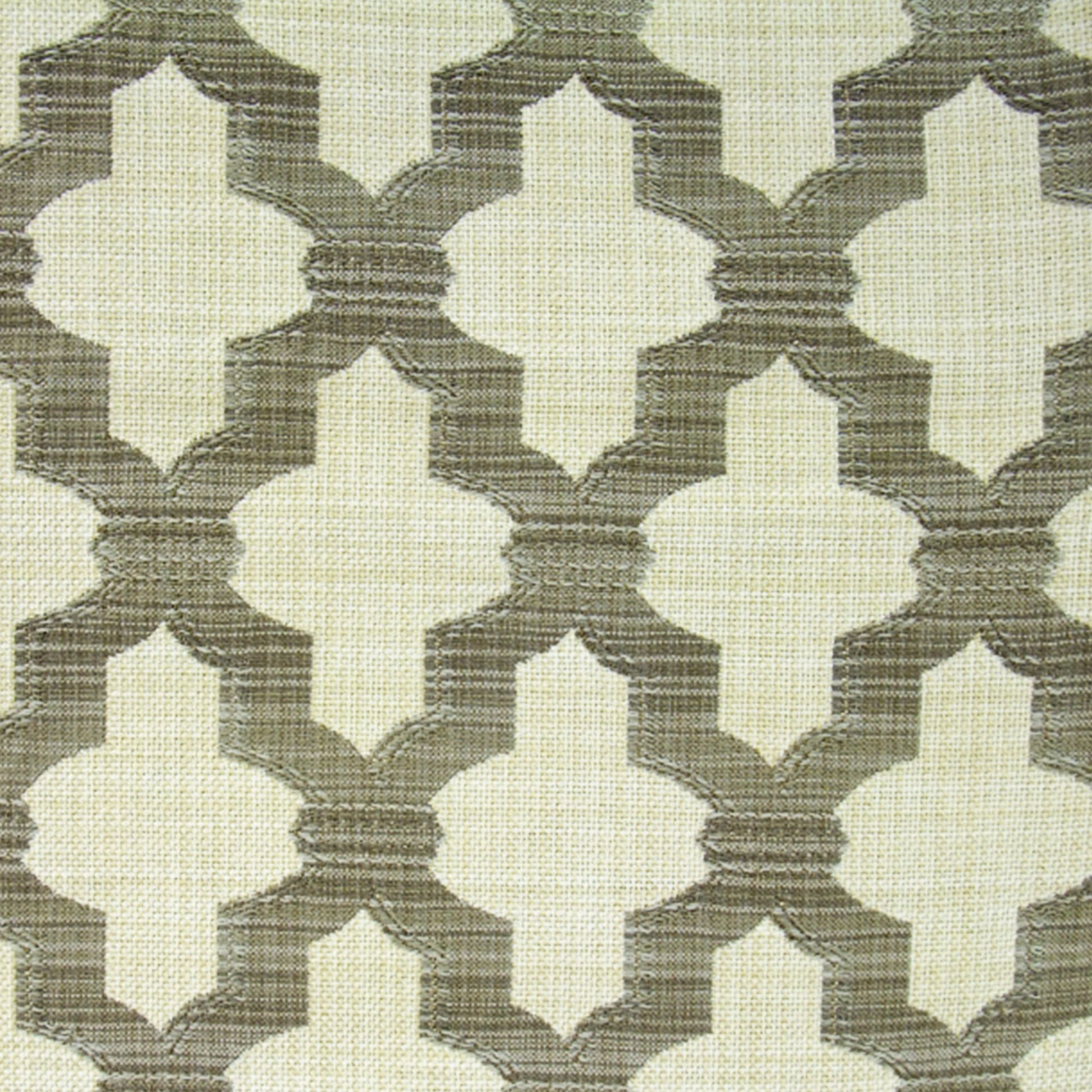 Cream and taupe woven fabric with interlocking quatrefoil lattice pattern and linen texture.