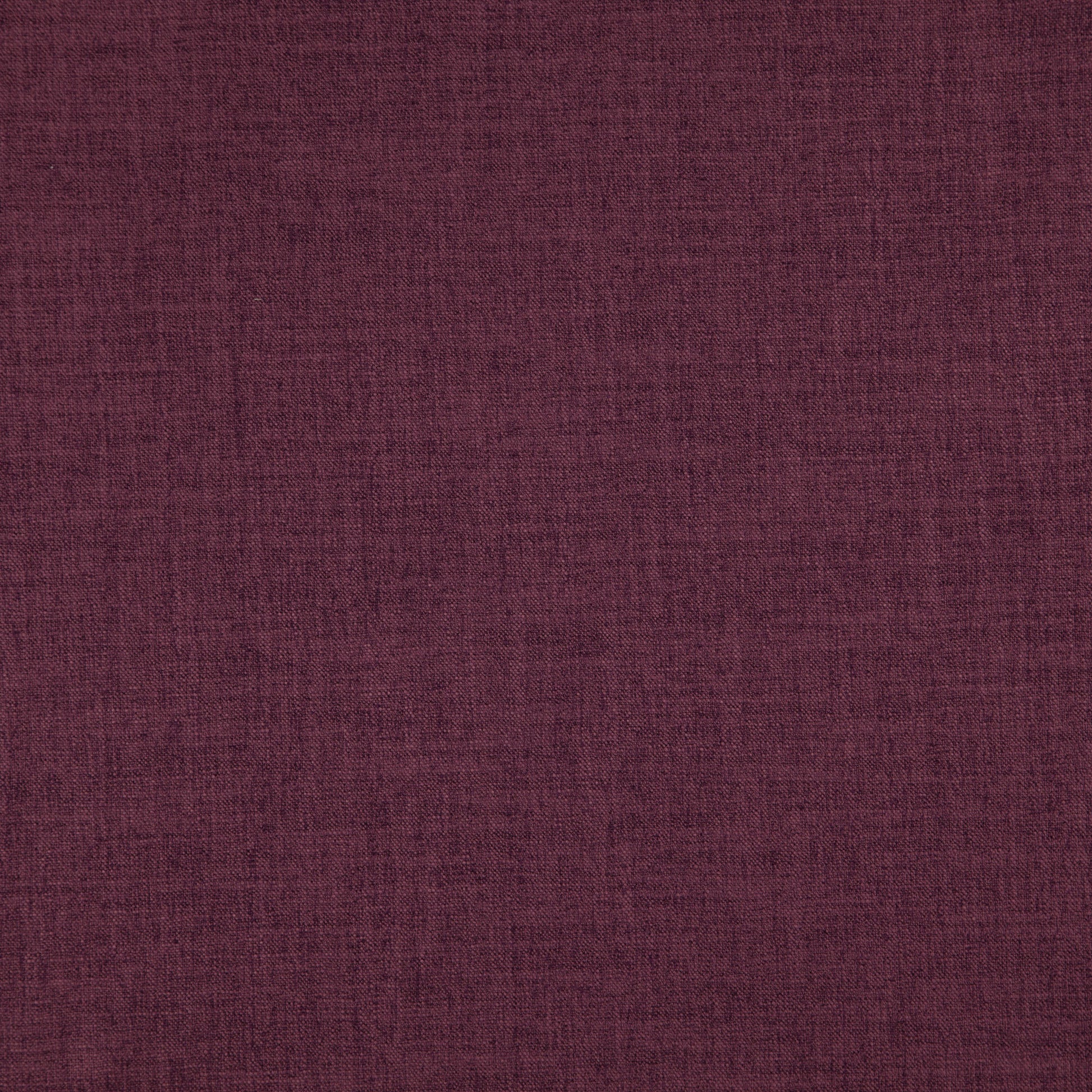 Close-up of purple woven fabric with a linen texture and subtle crosshatch, ideal for upholstery or apparel.