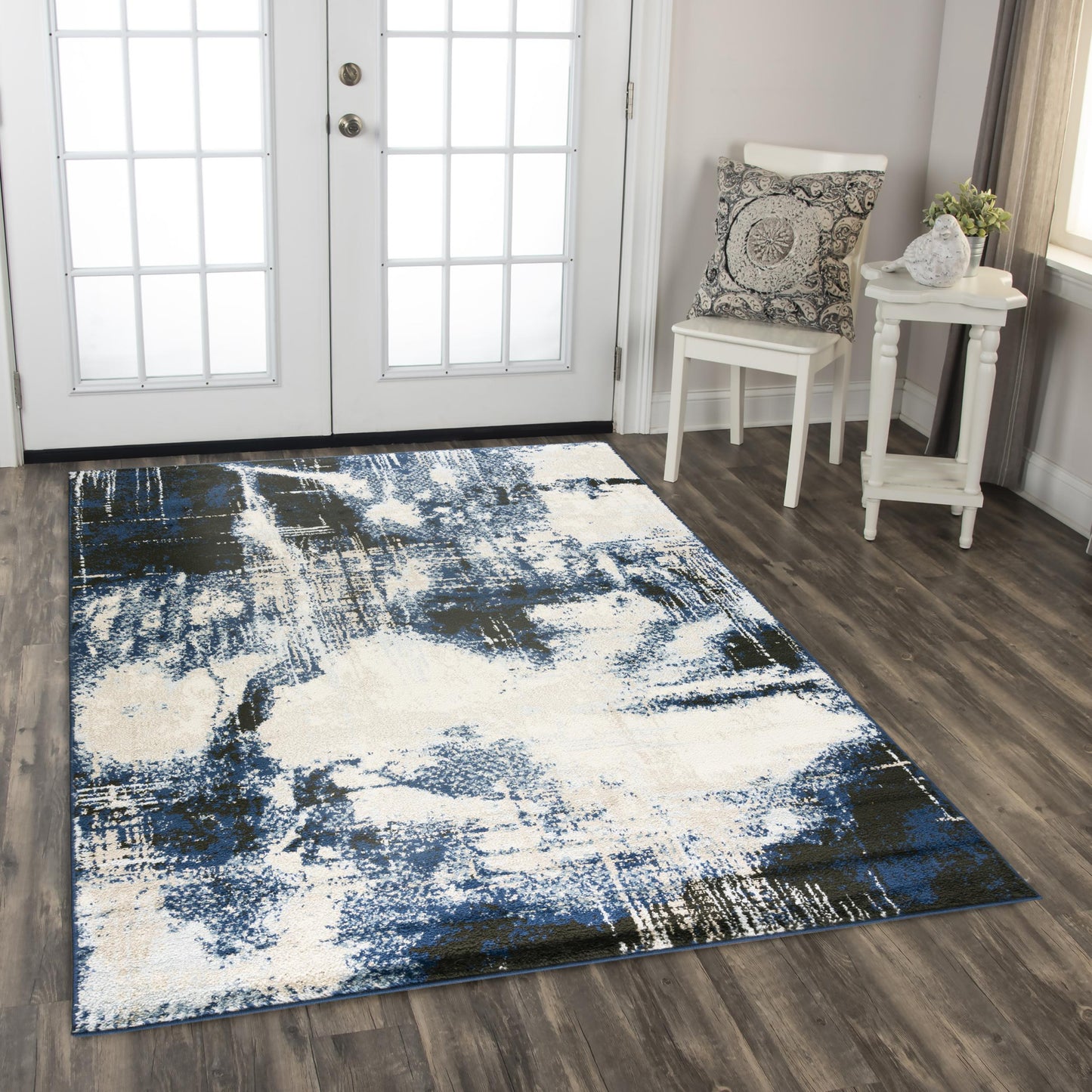 Contemporary rug on floor, 8' x 10'.