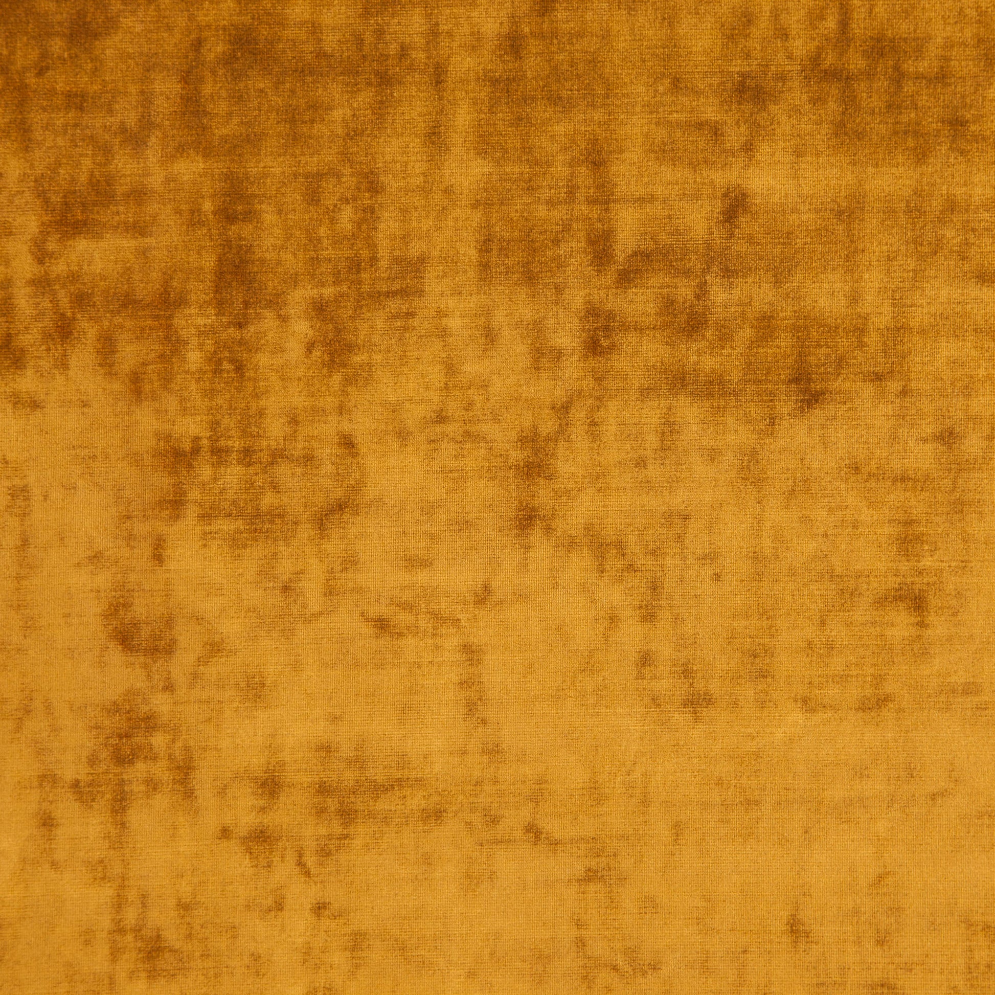 Rust-orange crushed velvet fabric with soft sheen and subtle marbling