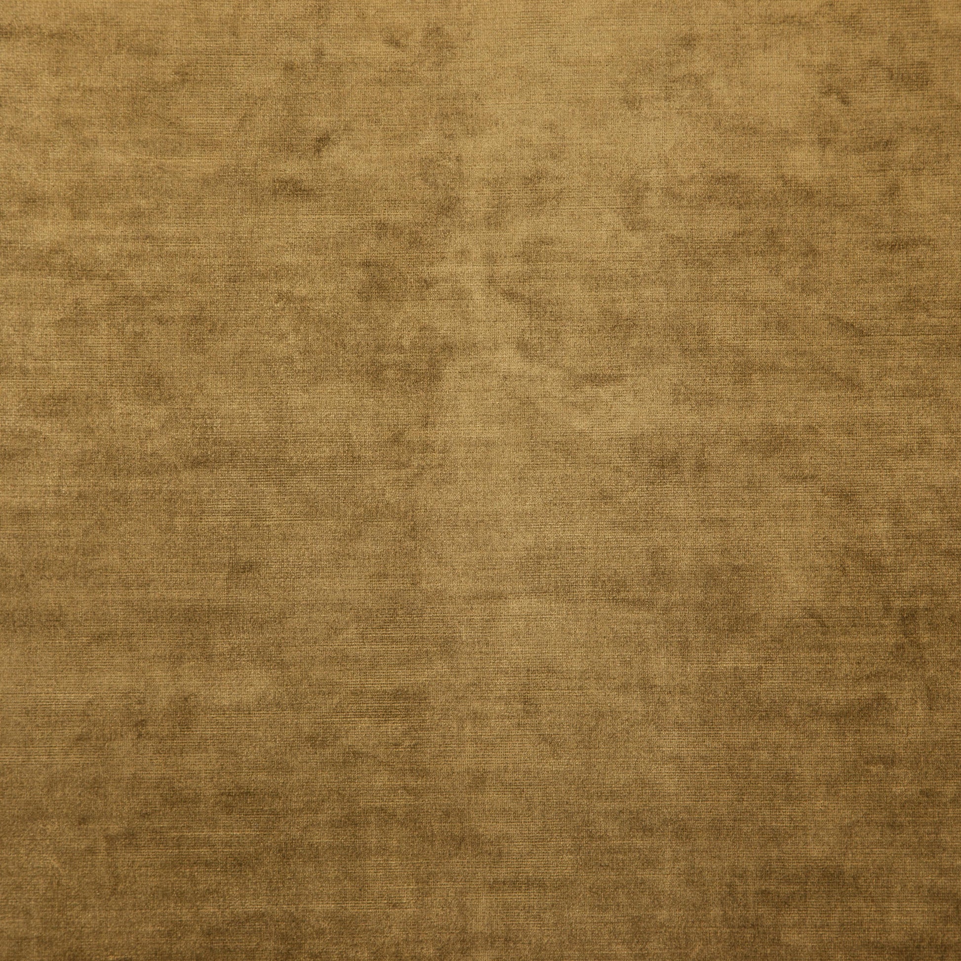 Plain brown velvet fabric texture with soft brushed nap and warm neutral tone.