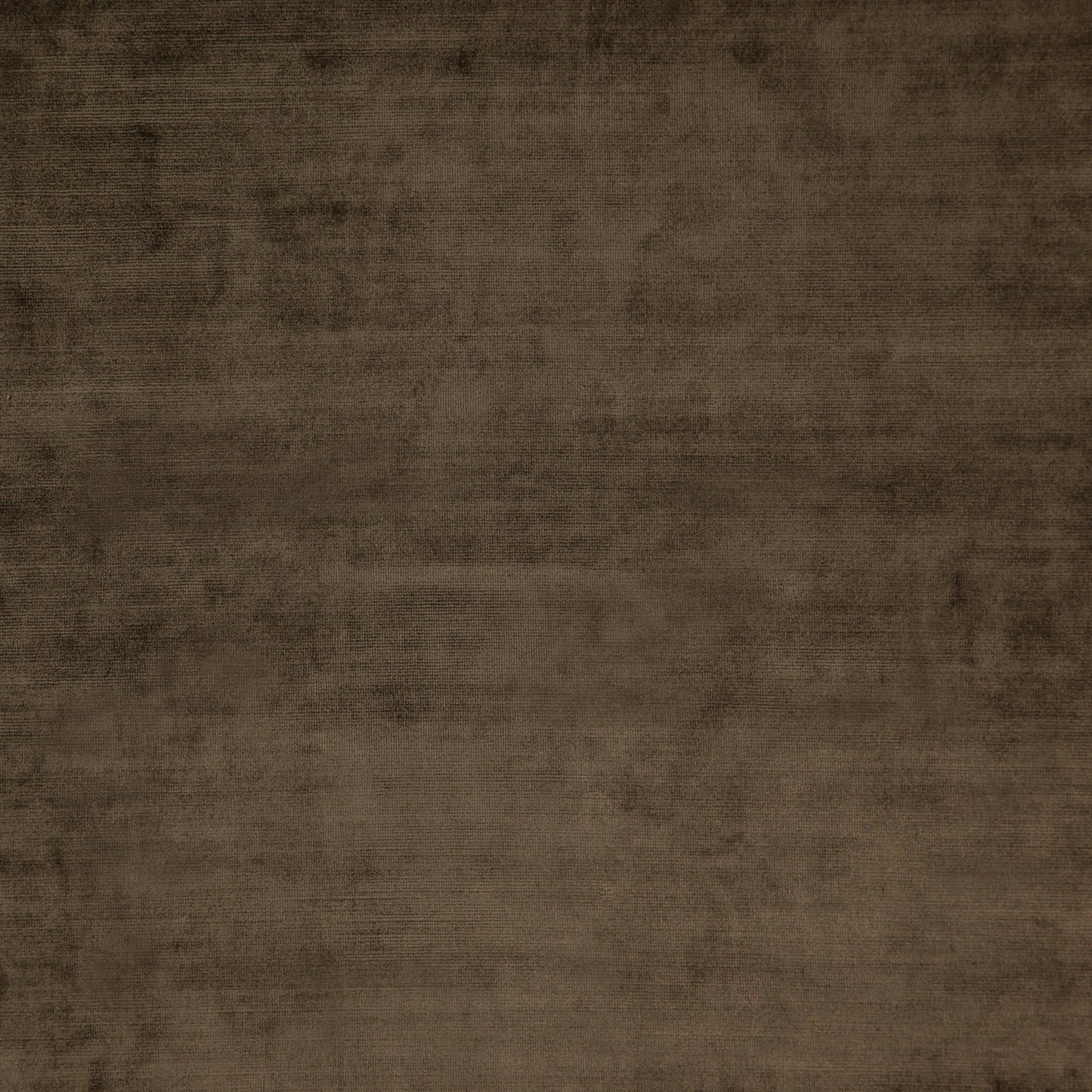 Brown velvet fabric with a smooth, plush texture and a plain, even finish.