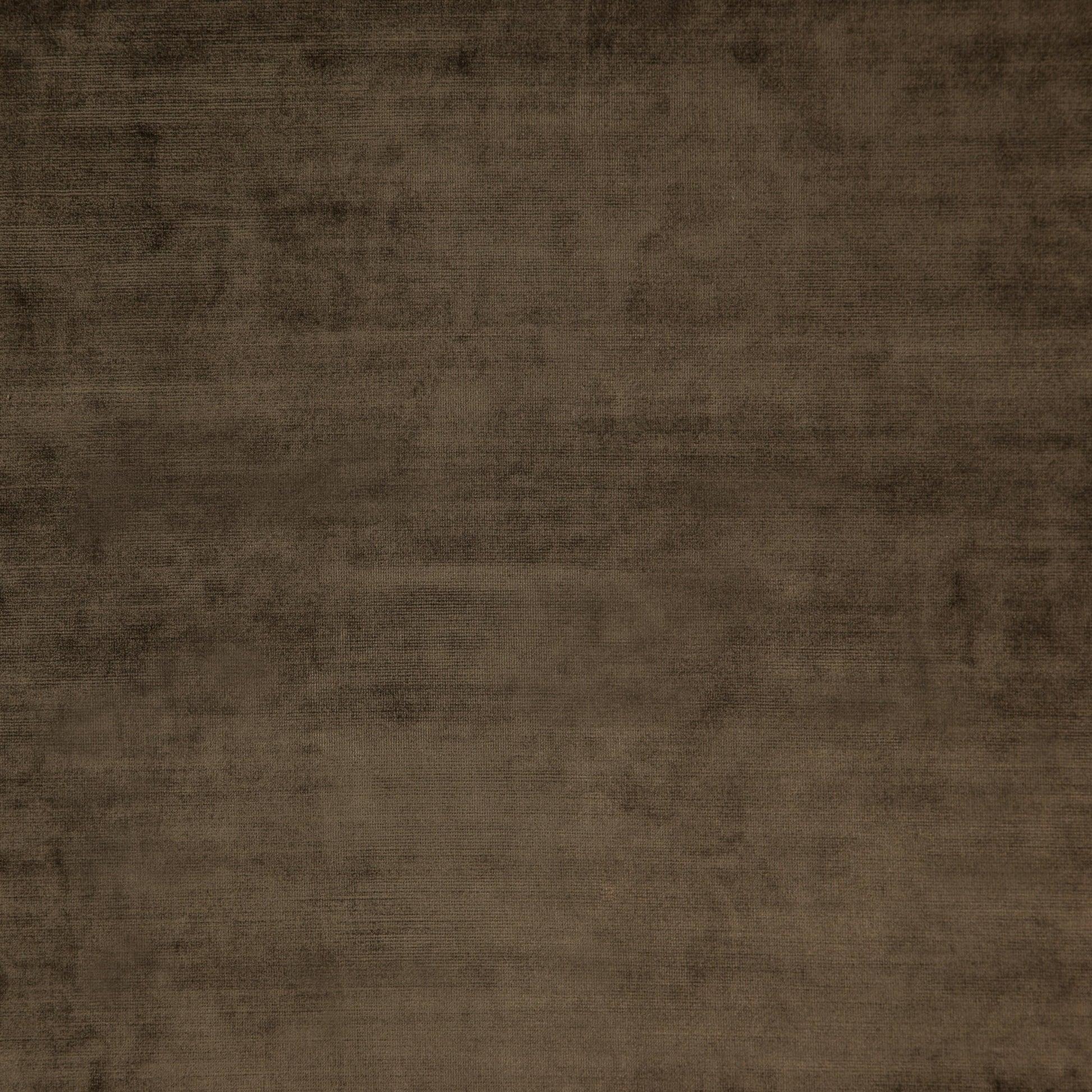 Brown velvet fabric with a smooth, plush texture and a plain, even finish.