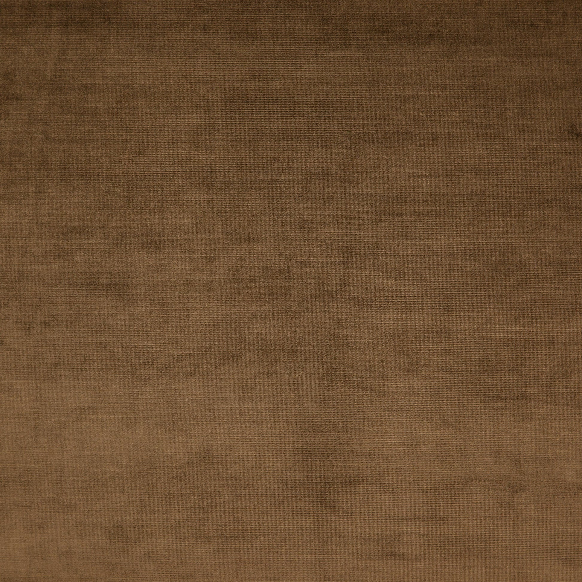 Brown velvet fabric swatch with plush nap, rich texture; ideal for upholstery or home decor.
