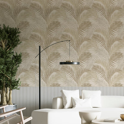 Living room with beige palm-leaf wallpaper, white sofa and cushions, black arched floor lamp, potted tree.