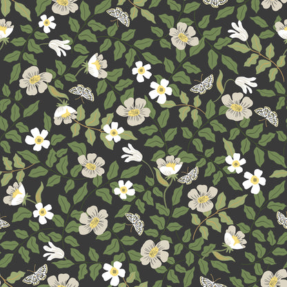 Black backdrop wallpaper with floral print in off-white and white flowers and green leaves.