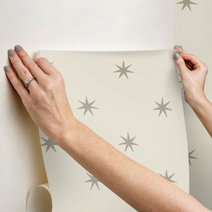 Star Splendor Wallpaper PSW1452RL in Wicker & Metallic Glint, showing removable peel‑and‑stick metallic star pattern, ideal for accent walls and rental‑friendly interiors.