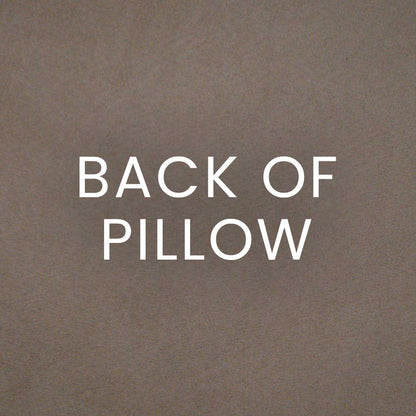 Back of floral Hampton pillow in oyster suede with a warm brown textured surface.