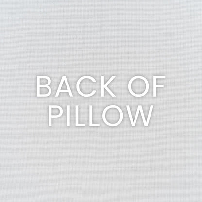 Back of pillow with white embossed text 'BACK OF PILLOW' on light grey textured fabric.
