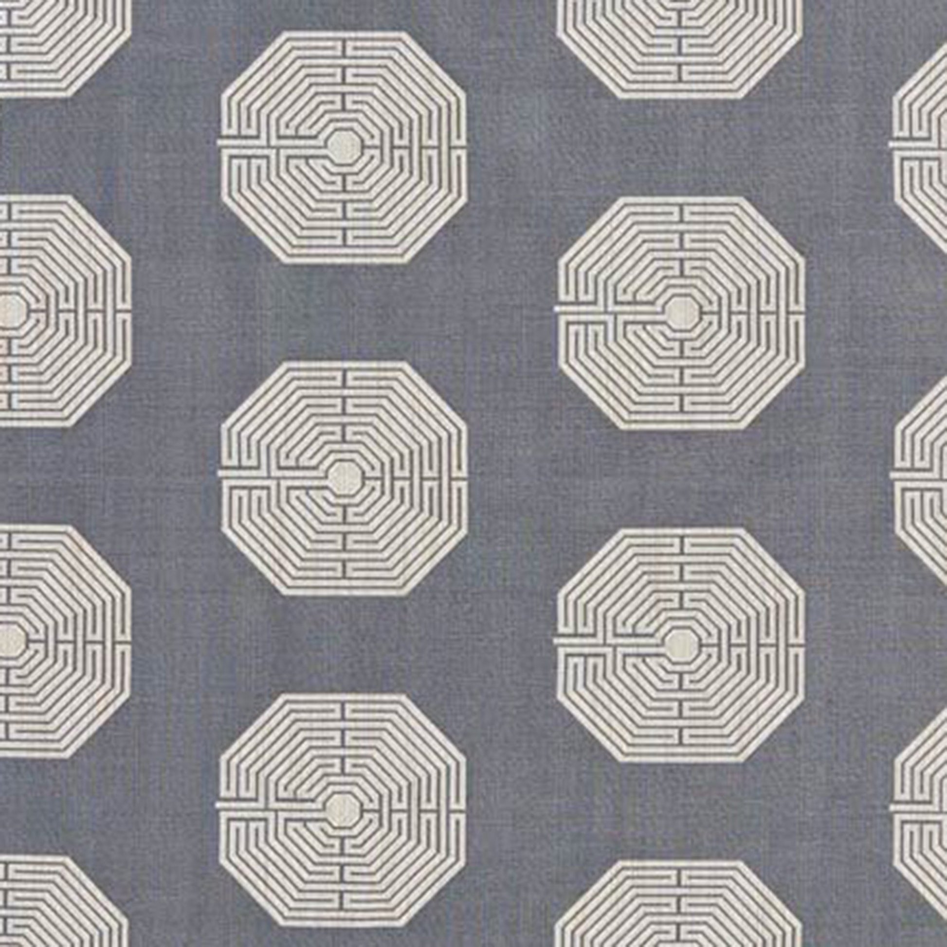 Blue-gray fabric with repeating white octagonal maze patterns & geometric textile design